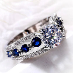 Blue/White Round Diamonds Ring